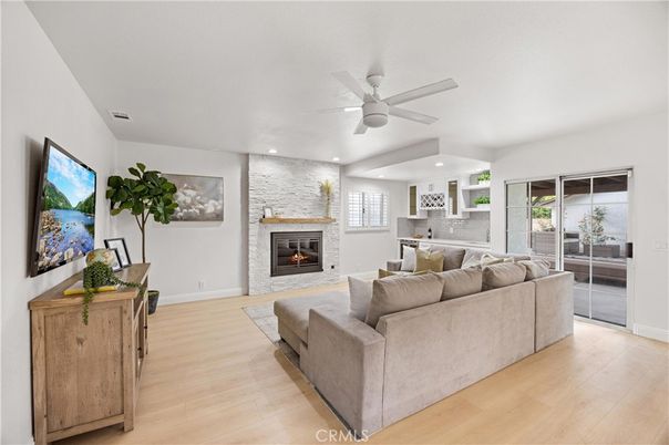 Fireplace, Interior, Kitchen, Living room, Recessed Lighting, Stone Walls, Wood Texture Flooring