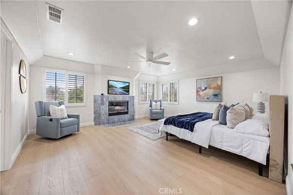 Bedroom, Fireplace, Interior, Recessed Lighting, Wood Texture Flooring