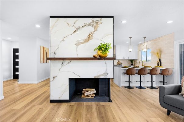 Fireplace, Interior, Kitchen, Marble Walls, Pendant Lights, Recessed Lighting, Wood Texture Flooring