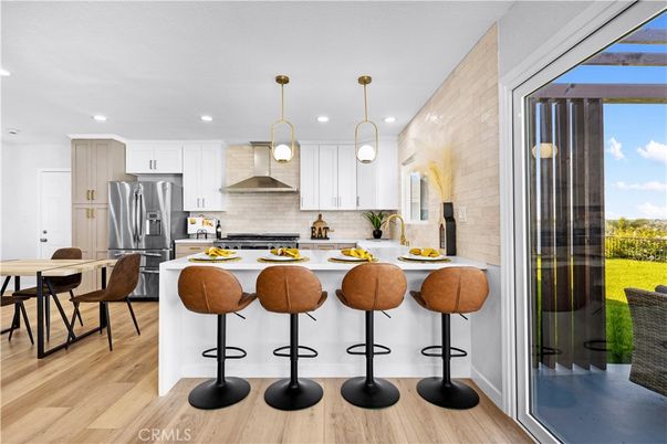 Dining room, Interior, Kitchen, Pendant Lights, Recessed Lighting, Stainless Steel Appliances, Wood Texture Flooring