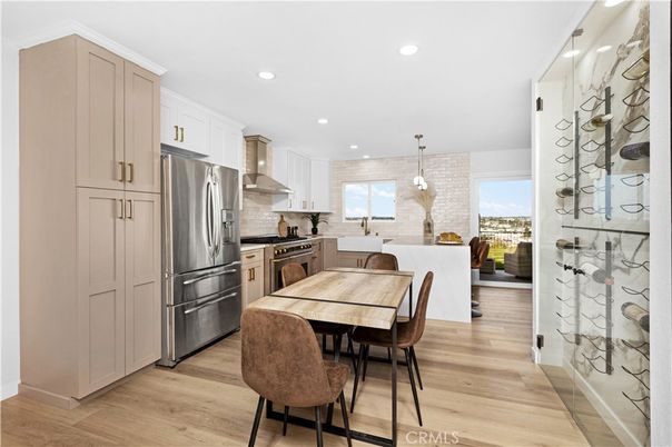 Dining room, Interior, Kitchen, Pendant Lights, Recessed Lighting, Stainless Steel Appliances, Wood Texture Flooring