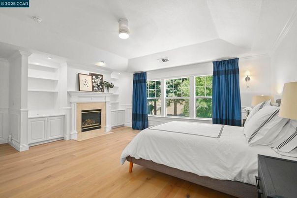 Bedroom, Fireplace, Interior, Recessed Lighting, Wood Texture Flooring