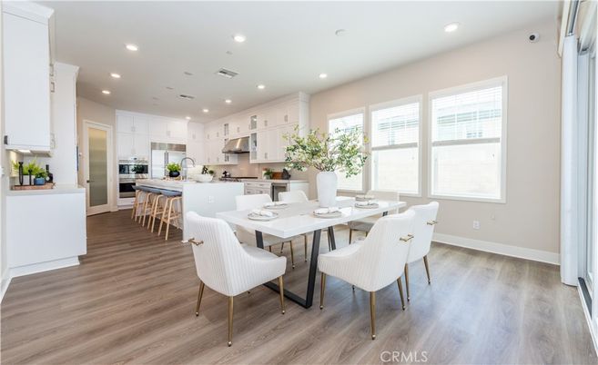 Dining room, Interior, Kitchen, Recessed Lighting, Stainless Steel Appliances, Wood Texture Flooring