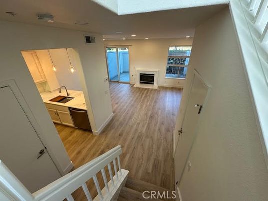 Fireplace, Interior, Pendant Lights, Recessed Lighting, Wood Texture Flooring