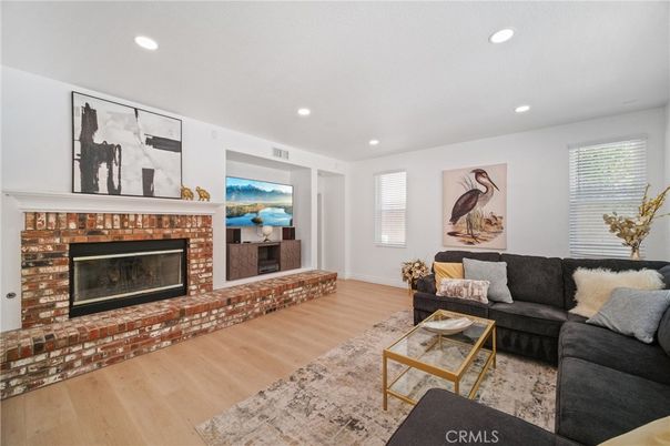 Fireplace, Interior, Living room, Recessed Lighting, Wood Texture Flooring