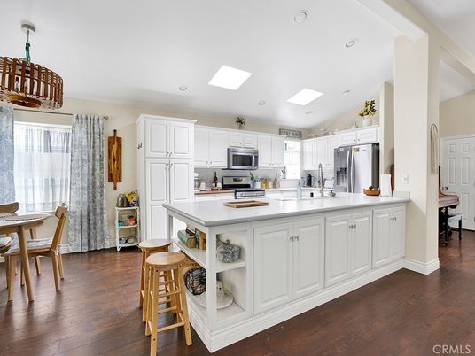Dining room, Interior, Kitchen, Recessed Lighting, Stainless Steel Appliances, Wood Texture Flooring