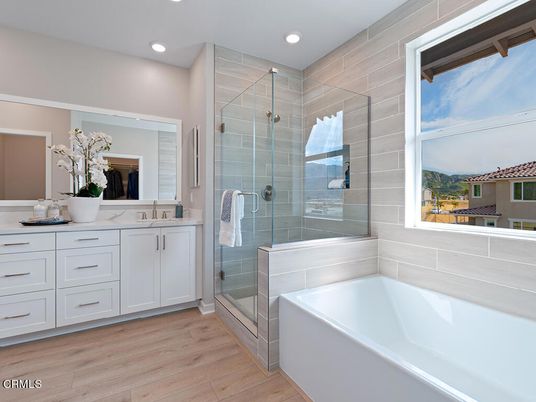 Bathroom, Dual Sink Vanities, Glass Shower, Interior, Recessed Lighting, Wood Texture Flooring