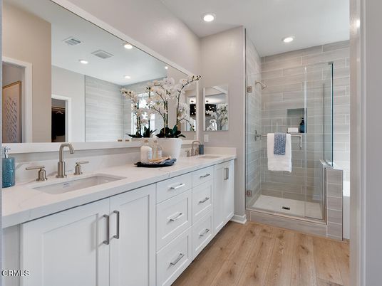 Bathroom, Dual Sink Vanities, Glass Shower, Interior, Recessed Lighting, Wood Texture Flooring