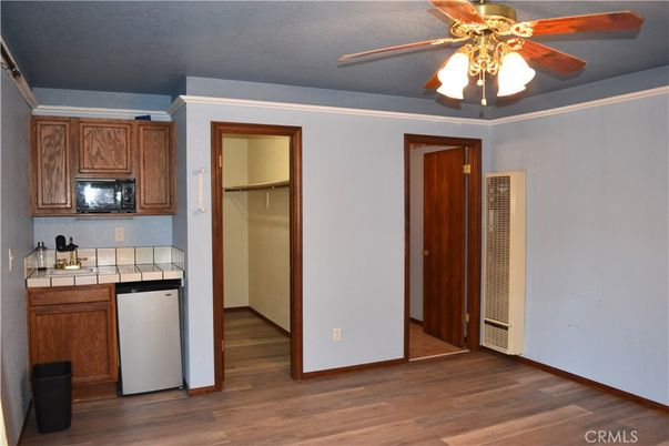 Interior, Kitchen, Tile Countertops, Wood Texture Flooring