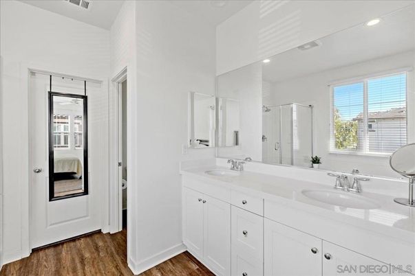 Bathroom, Dual Sink Vanities, Interior, Recessed Lighting, Wood Texture Flooring