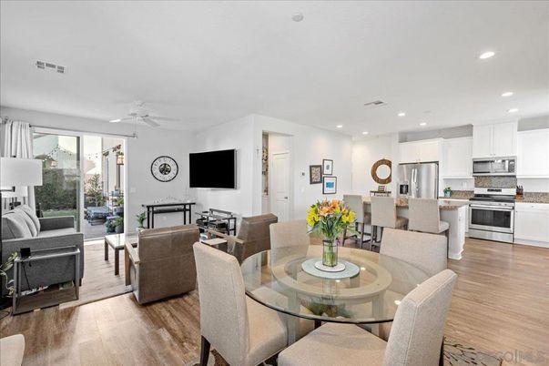 Dining room, Interior, Kitchen, Living room, Recessed Lighting, Stainless Steel Appliances, Wood Texture Flooring