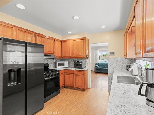 Interior, Kitchen, Recessed Lighting, Stainless Steel Appliances, Wood Texture Flooring