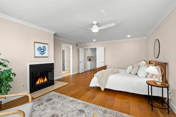 Bedroom, Fireplace, Interior, Recessed Lighting, Wood Texture Flooring