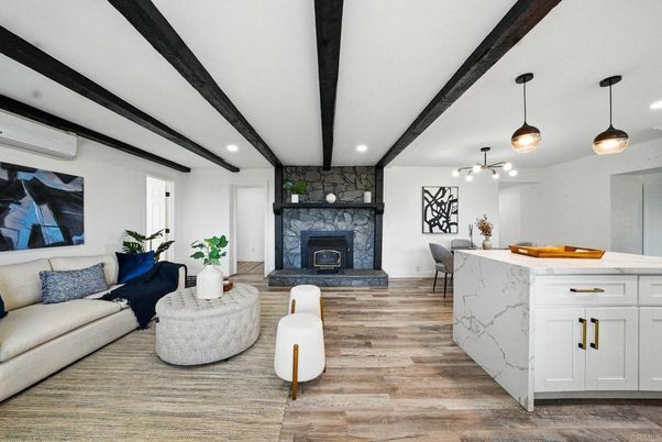 Dining room, Fireplace, Interior, Living room, Pendant Lights, Recessed Lighting, Wooden Beams, Wood Texture Flooring