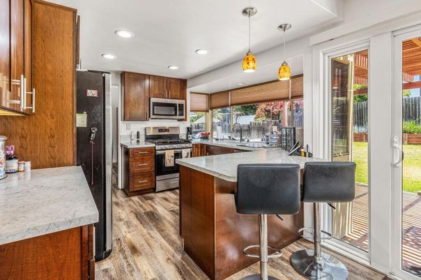 Interior, Kitchen, Pendant Lights, Recessed Lighting, Stainless Steel Appliances, Wood Texture Flooring