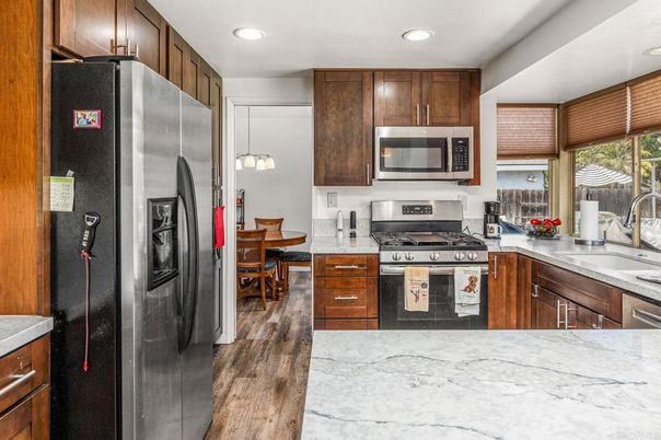 Dining room, Interior, Kitchen, Pendant Lights, Recessed Lighting, Stainless Steel Appliances, Wood Texture Flooring