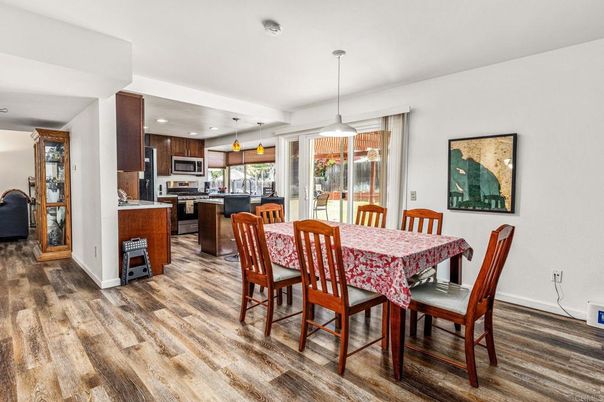 Dining room, Interior, Kitchen, Pendant Lights, Recessed Lighting, Stainless Steel Appliances, Wood Texture Flooring
