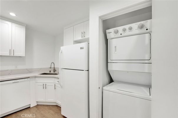 Interior, Kitchen, Recessed Lighting, Utility Closets, Washer, Wood Texture Flooring