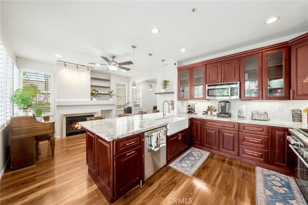 Fireplace, Interior, Kitchen, Pendant Lights, Recessed Lighting, Wood Texture Flooring