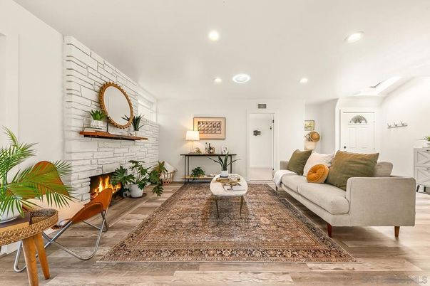 Fireplace, Interior, Living room, Recessed Lighting, Stone Walls, Wood Texture Flooring
