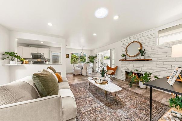 Dining room, Fireplace, Interior, Kitchen, Living room, Pendant Lights, Recessed Lighting, Stainless Steel Appliances, Stone Walls, Wood Texture Flooring