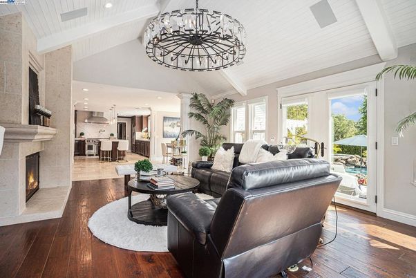 Chandelier, Fireplace, Interior, Kitchen, Living room, Pendant Lights, Recessed Lighting, Wood Texture Flooring