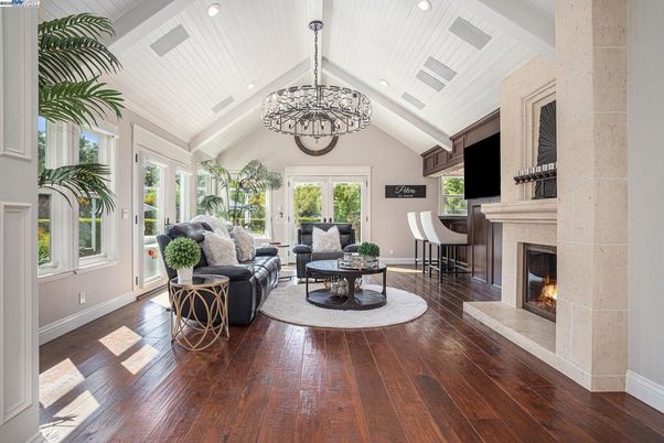 Chandelier, Dining room, Fireplace, Interior, Living room, Recessed Lighting, Wood Texture Flooring