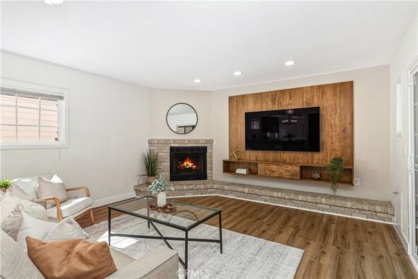 Fireplace, Interior, Living room, Recessed Lighting, Wood Texture Flooring