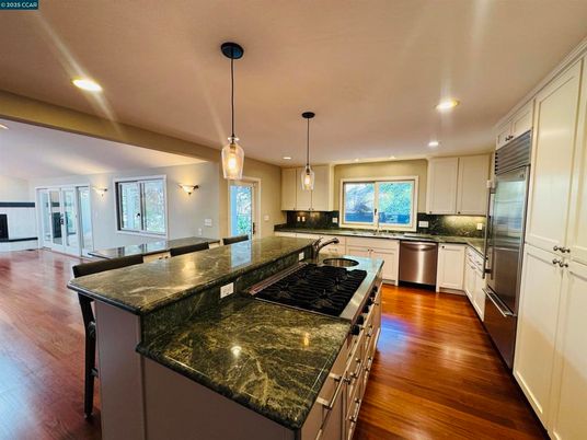Interior, Kitchen, Pendant Lights, Recessed Lighting, Stainless Steel Appliances, Wood Texture Flooring