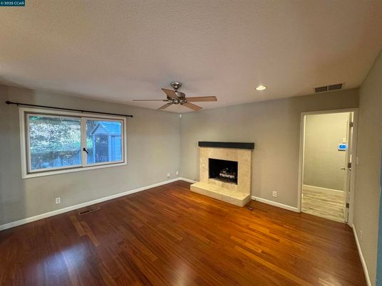 Empty room, Fireplace, Interior, Recessed Lighting, Wood Texture Flooring