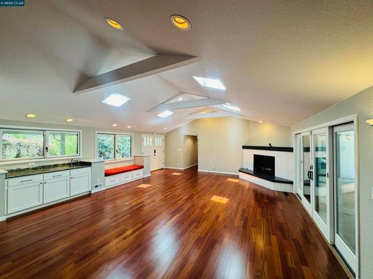 Empty room, Fireplace, Interior, Kitchen, Recessed Lighting, Wood Texture Flooring