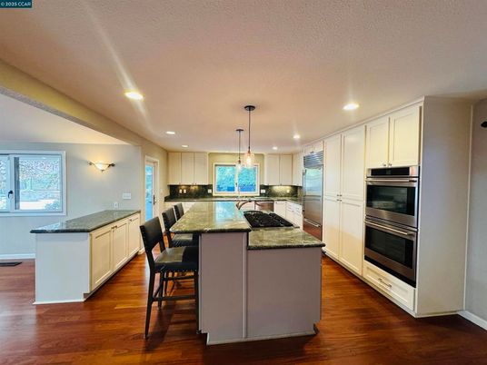 Interior, Kitchen, Pendant Lights, Recessed Lighting, Stainless Steel Appliances, Wood Texture Flooring