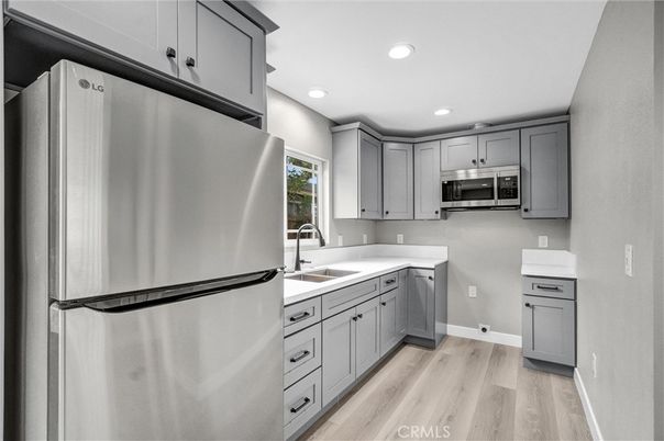 Interior, Kitchen, Recessed Lighting, Stainless Steel Appliances, Wood Texture Flooring