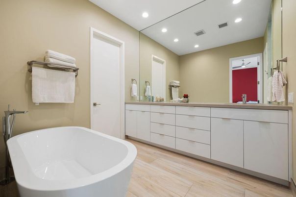 Bathroom, Dual Sink Vanities, Free Standing Baths, Interior, Recessed Lighting, Wood Texture Flooring