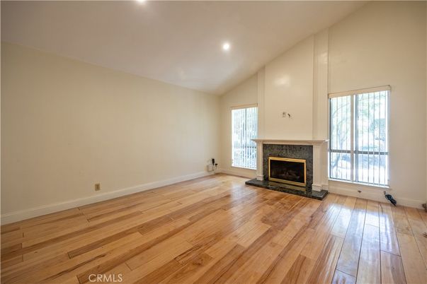 Empty room, Fireplace, Interior, Recessed Lighting, Wood Texture Flooring