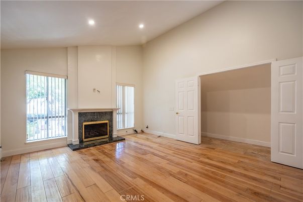 Empty room, Fireplace, Interior, Recessed Lighting, Wood Texture Flooring