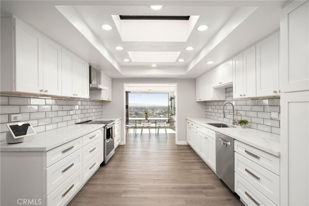 Dining room, Interior, Kitchen, Recessed Lighting, Stainless Steel Appliances, Wood Texture Flooring