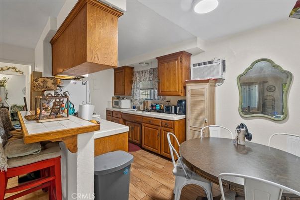 Dining room, Interior, Kitchen, Tile Countertops, Wood Texture Flooring