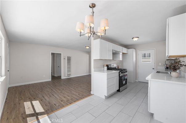Chandelier, Interior, Kitchen, Stainless Steel Appliances, Wood Texture Flooring