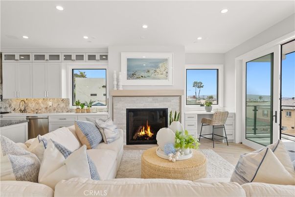 Fireplace, Interior, Living room, Recessed Lighting, Water, Wood Texture Flooring