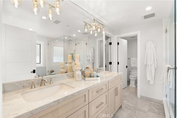 Bathroom, Dual Sink Vanities, Glass Shower, Interior, Marble, Recessed Lighting