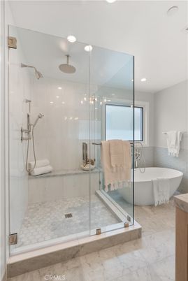 Bathroom, Free Standing Baths, Glass Shower, Interior, Marble, Marble Walls, Recessed Lighting