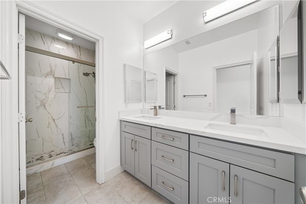 Bathroom, Dual Sink Vanities, Glass Shower, Interior, Marble Walls