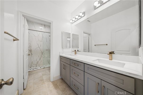 Bathroom, Dual Sink Vanities, Glass Shower, Interior, Marble Walls