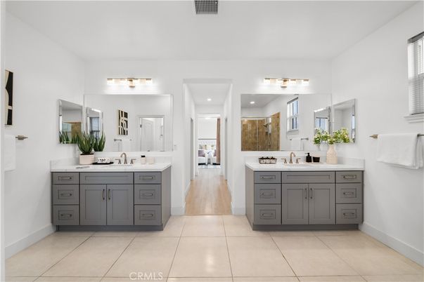 Bathroom, Dual Sink Vanities, Interior, Recessed Lighting, Wood Texture Flooring