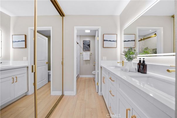 Bathroom, Dual Sink Vanities, Interior, Recessed Lighting, Wood Texture Flooring