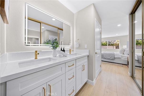 Bathroom, Bedroom, Dual Sink Vanities, Interior, Recessed Lighting, Wood Texture Flooring