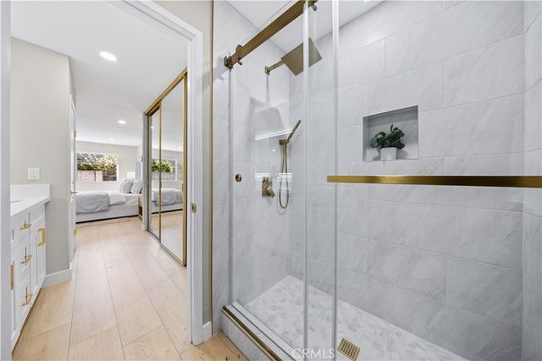 Bathroom, Glass Shower, Interior, Recessed Lighting, Wood Texture Flooring