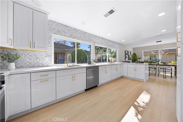 Dining room, Interior, Kitchen, Pendant Lights, Recessed Lighting, Stainless Steel Appliances, Wood Texture Flooring