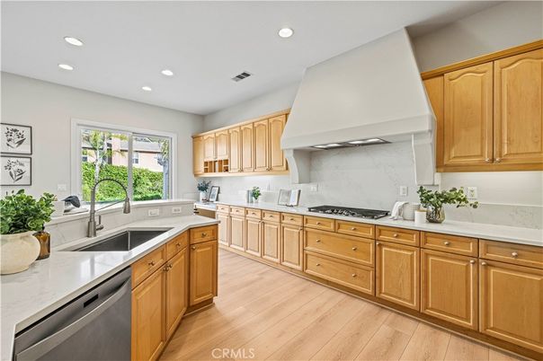 Interior, Kitchen, Marble Walls, Recessed Lighting, Stainless Steel Appliances, Wood Texture Flooring
